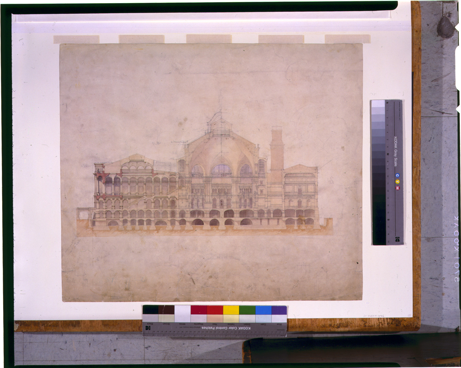 Architectural cross-section drawing of a large building with arcades — historic drawing