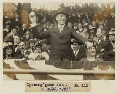 [President Woodrow Wilson throwing out the first ball, opening day, 1916]
