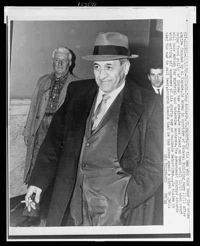 [Tony Accardo, half-length portrait, facing left, leaving Federal Building in Chicago]