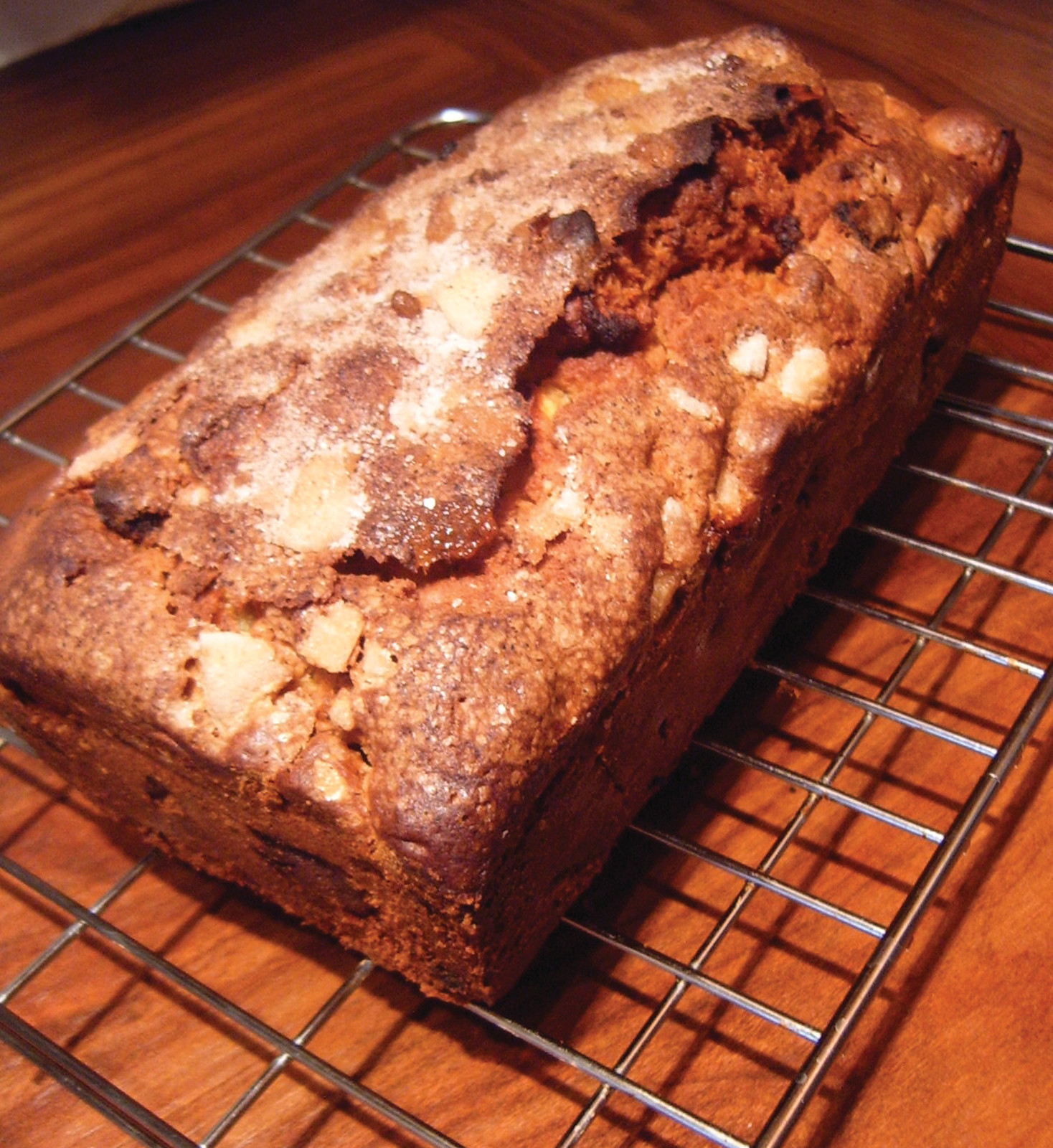 Loaf cake with chunks on a cooling rack — historic image