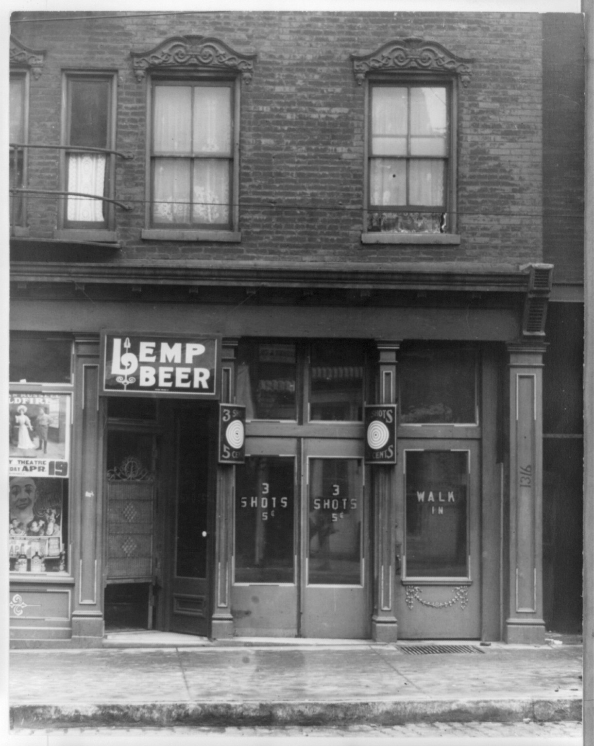 [Saloon with swinging door and sign above door Lemp beer"; sign in window "3 Shots 5 cents" in window. St. Louis Mo.]", [ca. 1890-1933] — historic photograph