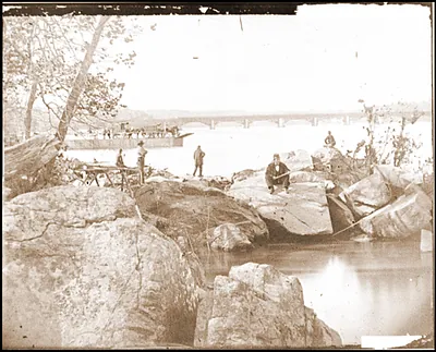 Washington D.C. Georgetown ferry-boat carrying wagons and Aqueduct Bridge beyond fr