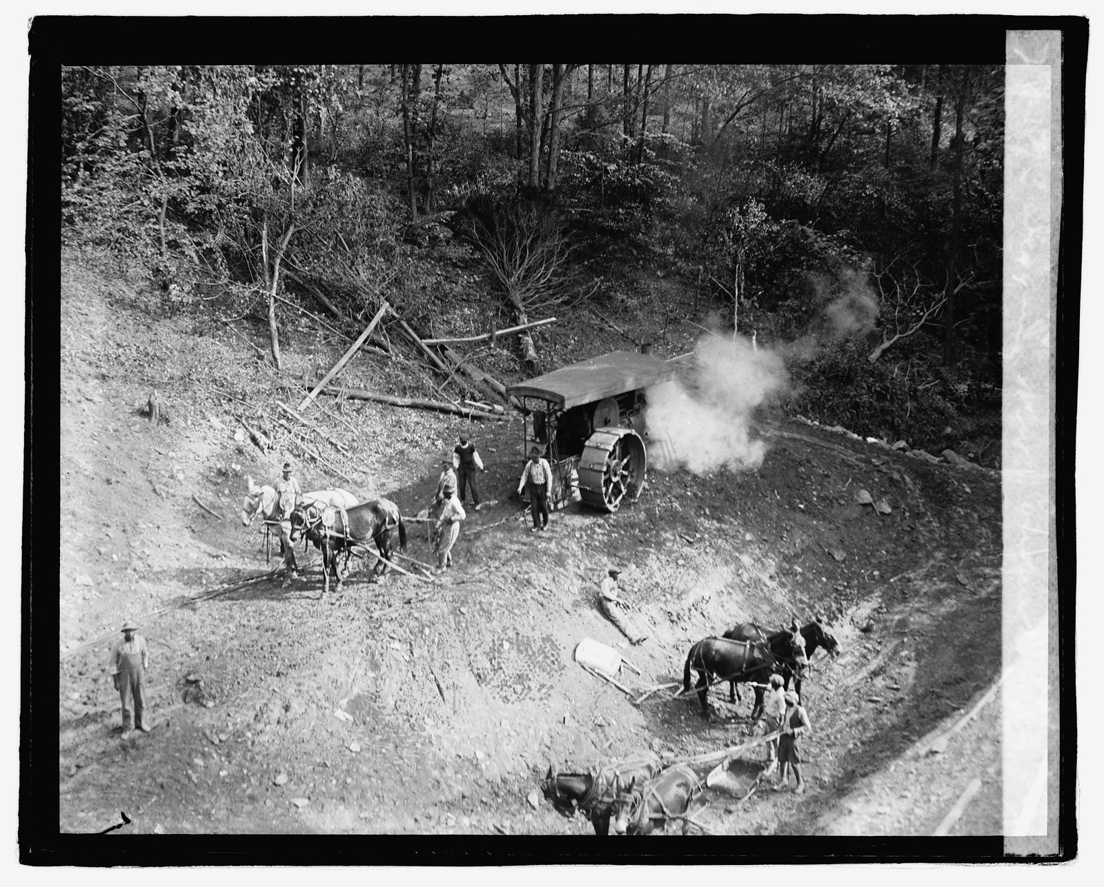 Digging new conduit, 10/3/22, [19]22 October 3. — historic photograph
