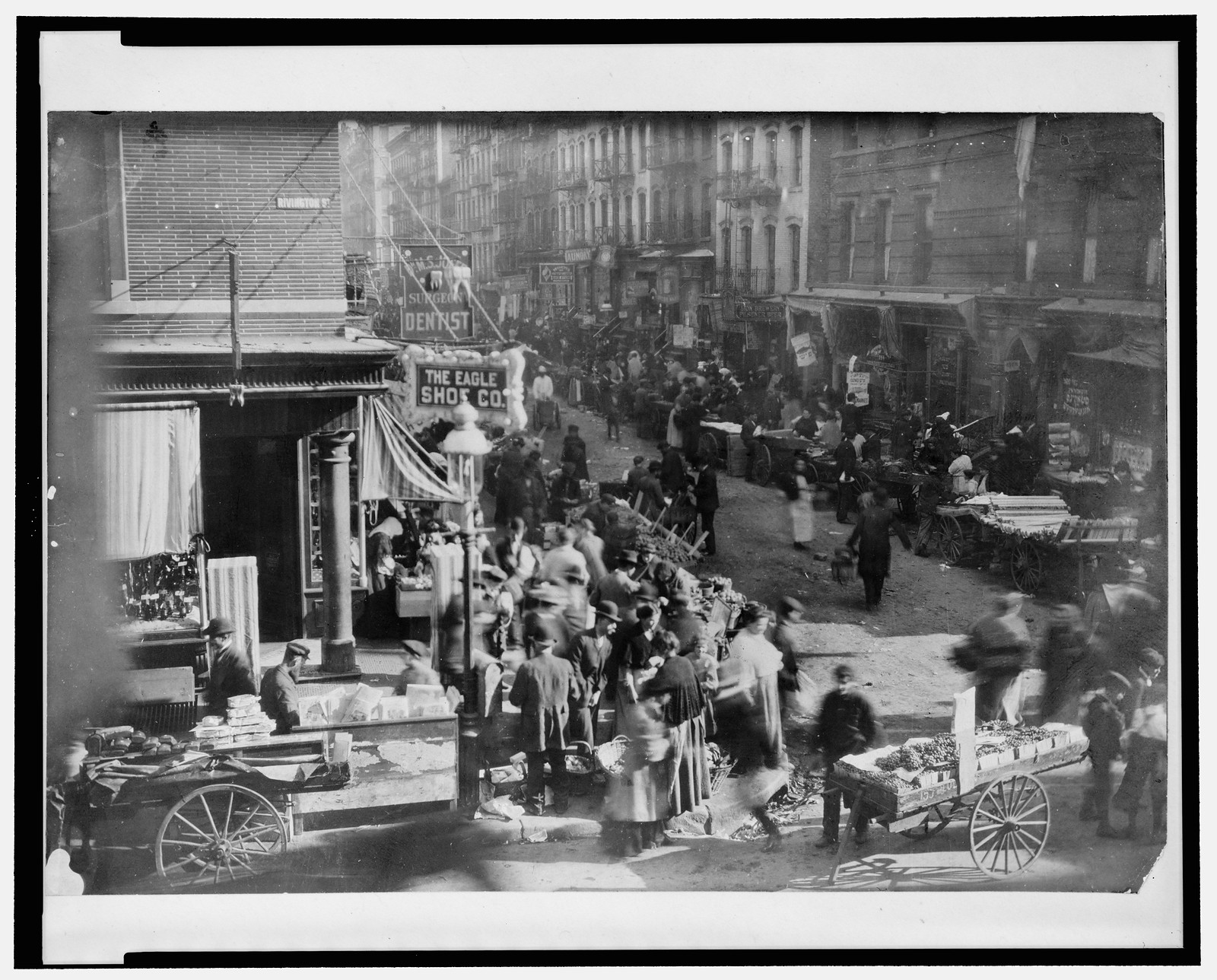 Sunday morning at Orchard and Rivington, [New York City], [1915? Oct. 7] — historic photograph