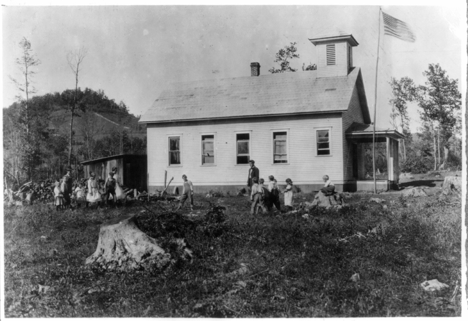 Caesar Mt. School, - one of the remote rural schools in Pocahontas Co. An average school except that it needs more playground space cleared and toilets need improving. Location: Pocahontas County, West Virginia / Photo by Lewis W. Hine., 1921 October. — historic photograph