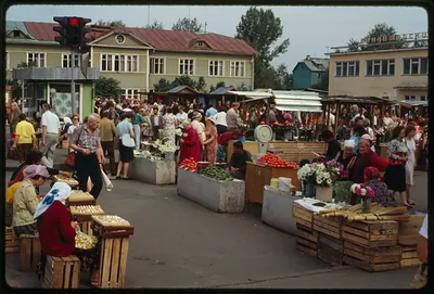 Outdoor market with vendors and produce, Russia