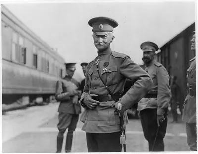 [Gen. Aleksei Alekseevich Brusilov and other officers in railroad yard]