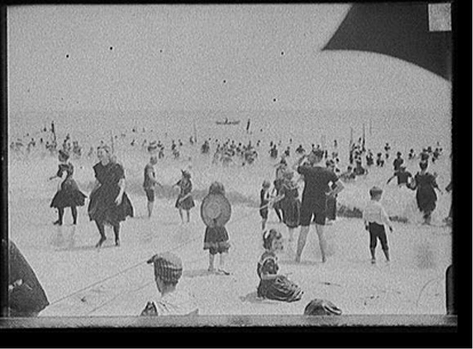 [Children playing with rope at beach, possibly Atlantic City, N.J.], [between 1890 and 1910] — historic photograph