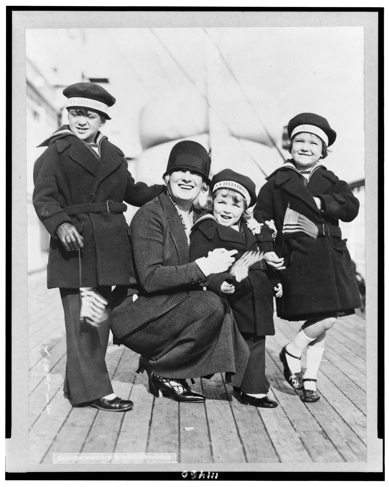 Popular American actress and family return to America aboard the S.S. Leviathan ..., 1924 — historic photograph