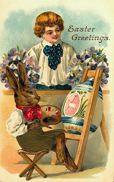 Easter Greetings: rabbit painting an egg beside a boy