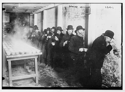 Bowery Mission, men lined up to receive food, New York