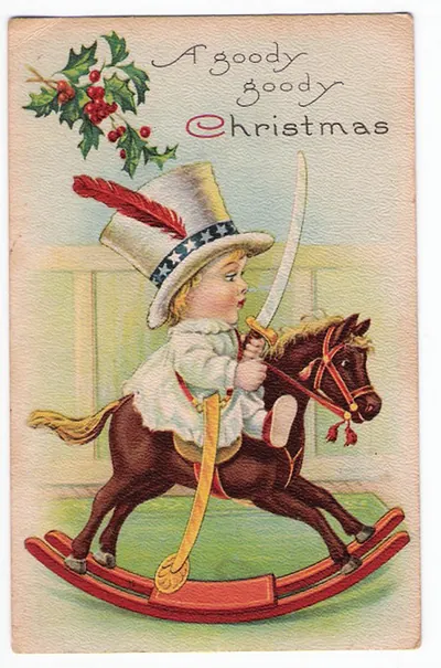 Christmas greeting card with child on rocking horse