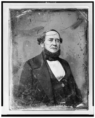 Daguerreotype portrait of a bearded man, half-length