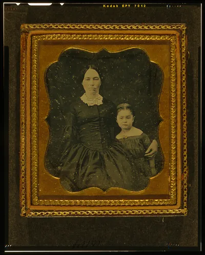 [Unidentified woman and girl]