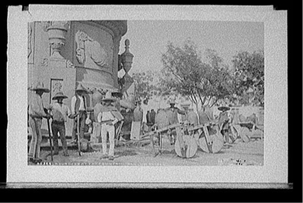 Aguadors [water carriers] at the fountain, San Luis Potosi, [between 1880 and 1897] — historic photograph