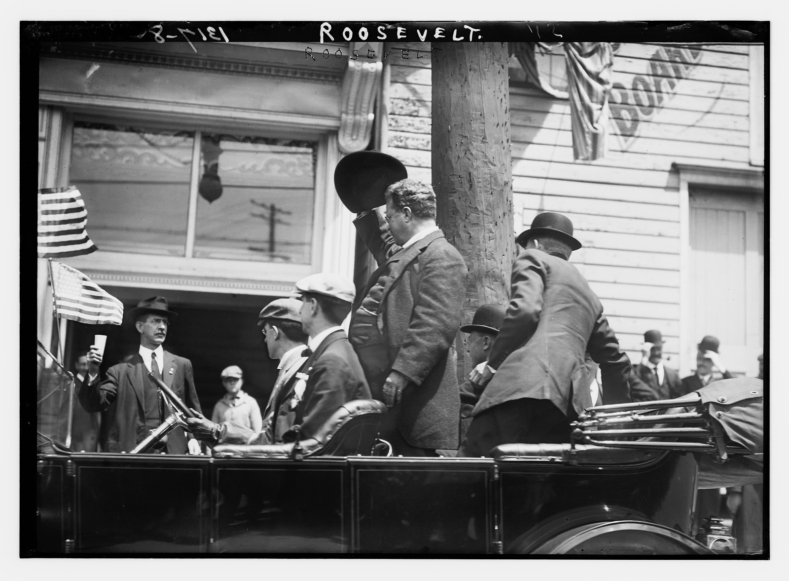 Roosevelt in car, n/a — historic photograph