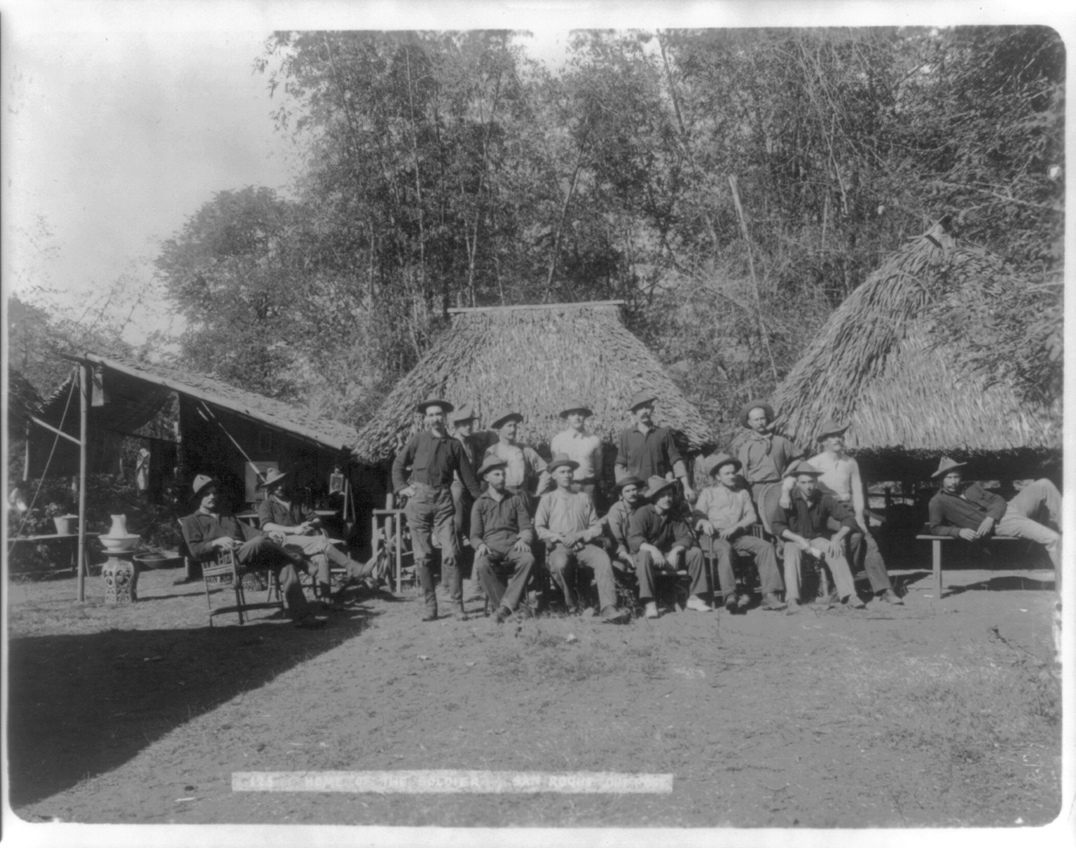 [Philippine Insurrection, 1899: U.S. soldiers posed at San Roque camp] — historic photograph