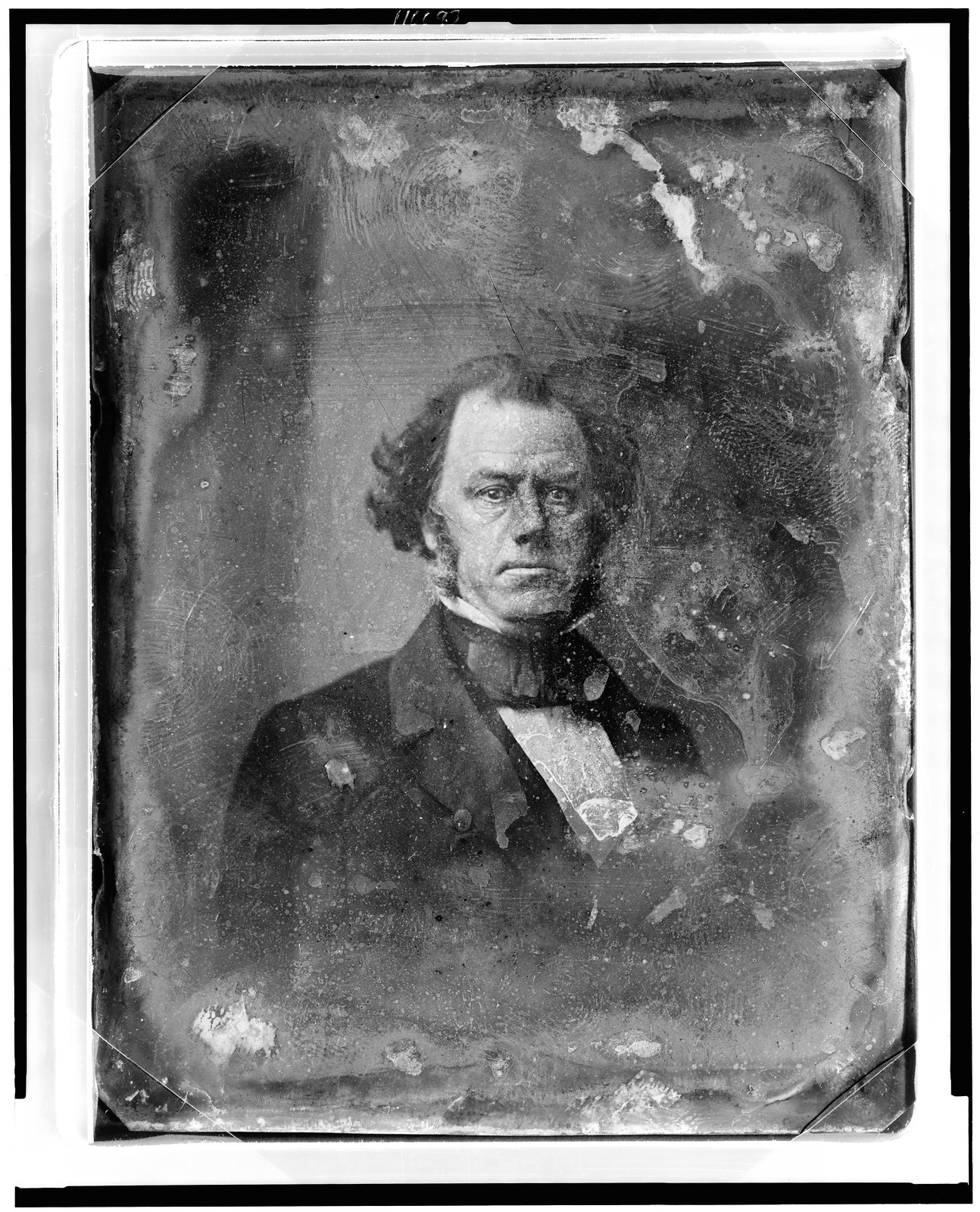 Unidentified man in dark coat and cravat, daguerreotype portrait, 1844 — historic photograph