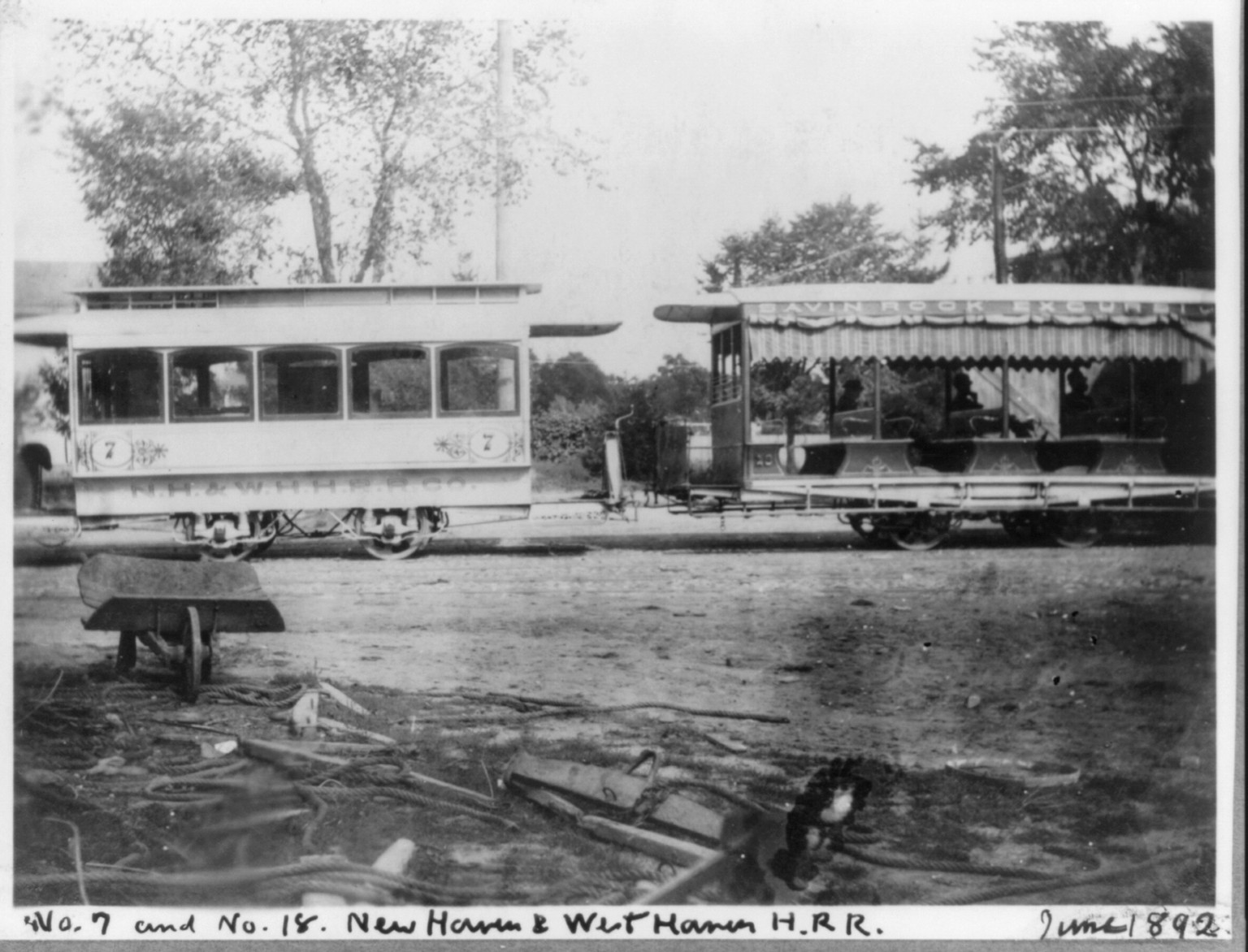 [Conn. - New Haven - horse-drawn street railways; N.H. & W.H.H.R.R. Co. cars in car barn yard: car nos. 7 & 18] — historic photograph