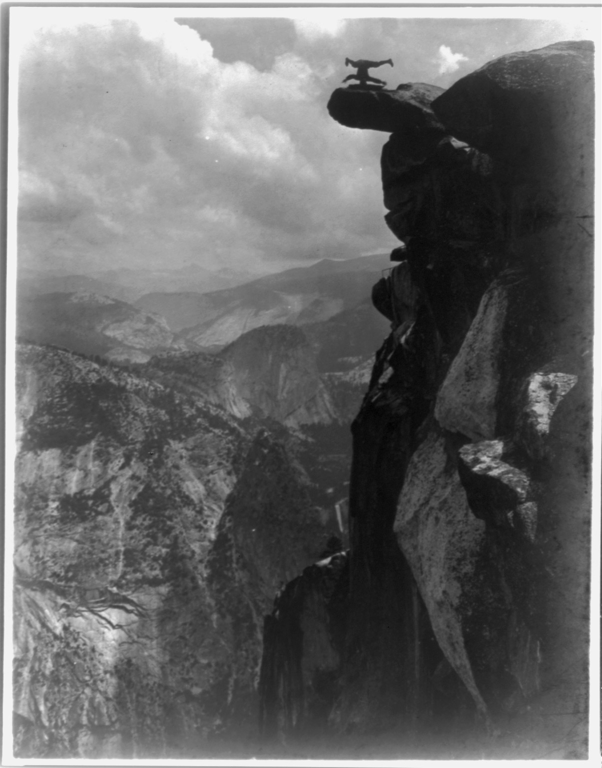 Balanced on his head, c1902. — historic photograph