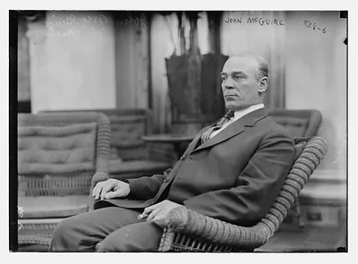 John McGuire of Cleveland seated in rocker