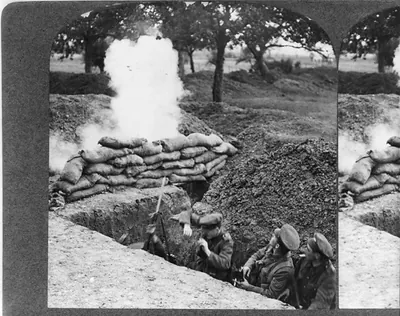 [Three British soldiers in trench under fire during World War I]