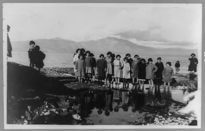 [Orphans from the interior of Asia brought to Marathon in Greece by the Near East Relief looking in wonder at the mountains and the sea, as it is the first time they have seen either]