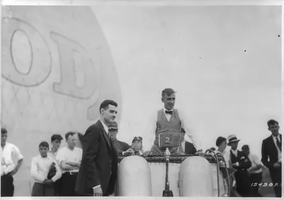 [Allen MacCracken, aide, and Ward T. Van Orman, pilot, in front of Goodyear VIII balloon]