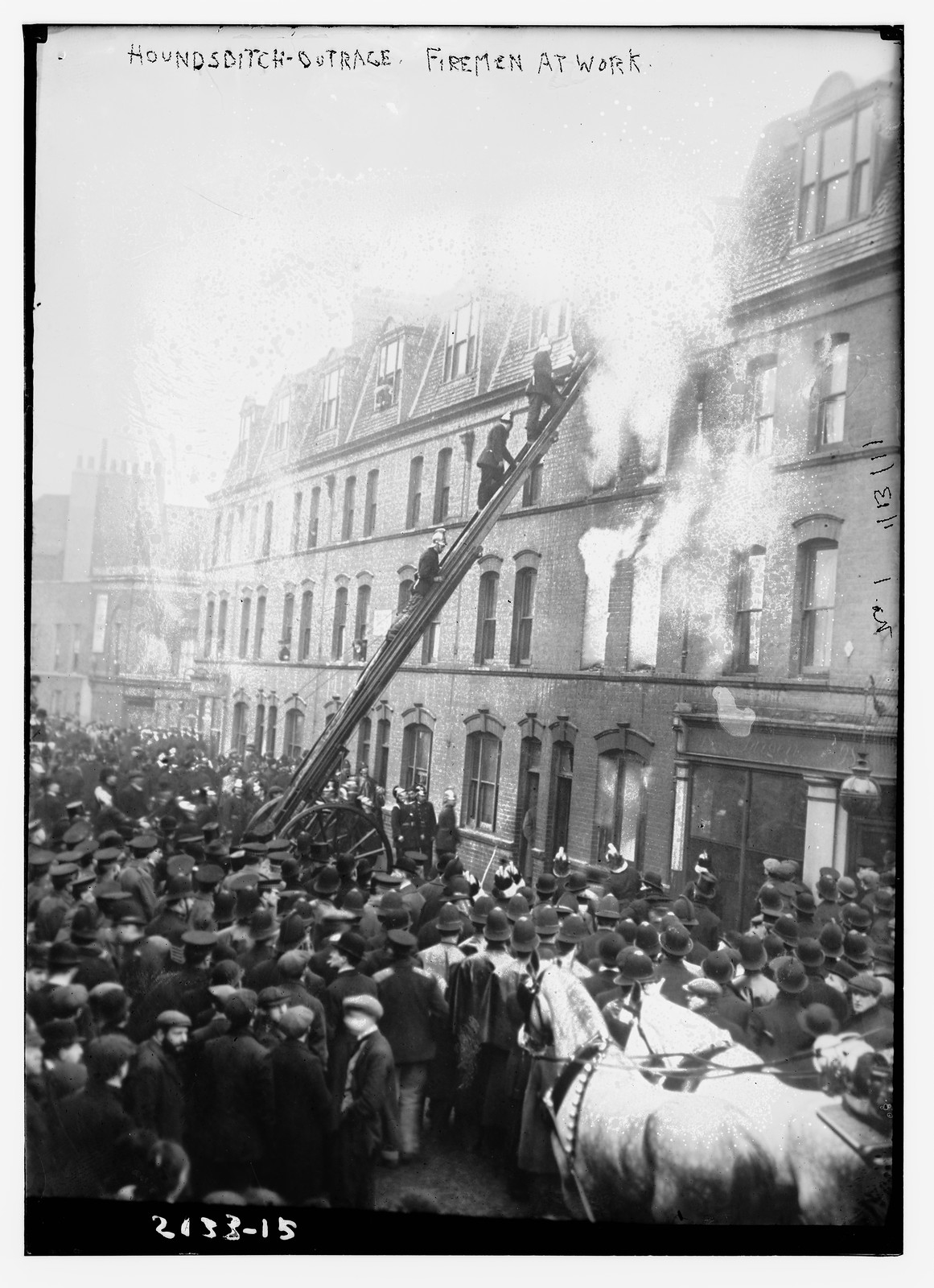 Hounsditch outrage, Firemen at work, n/a — historic photograph