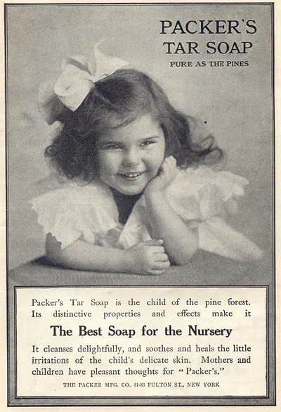 Packer's Tar Soap advertisement with smiling toddler in bow