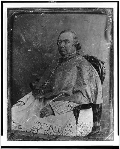 [Nicholas Patrick Wiseman, three-quarter length portrait, seated in armchair, three-quarters to the left, in clerical robe]