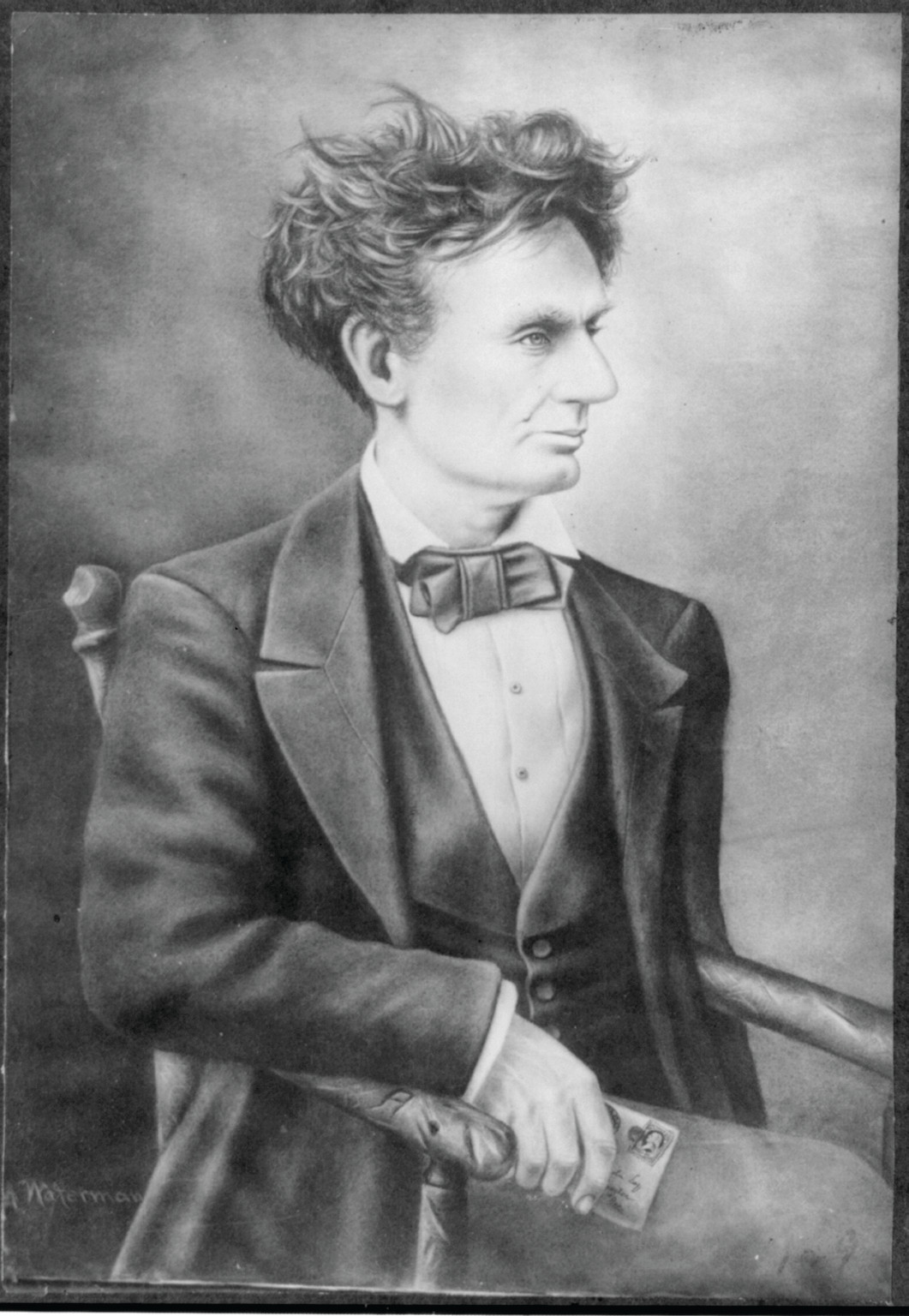 Abraham Lincoln, Three Quarters Length, Seated, Facing Right — historic photograph