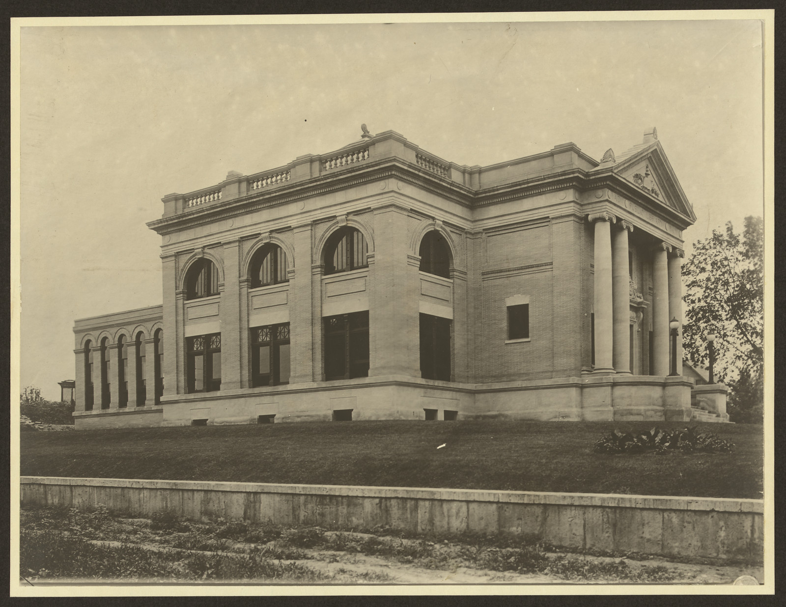 Neoclassical library building with columns and arched windows — historic image