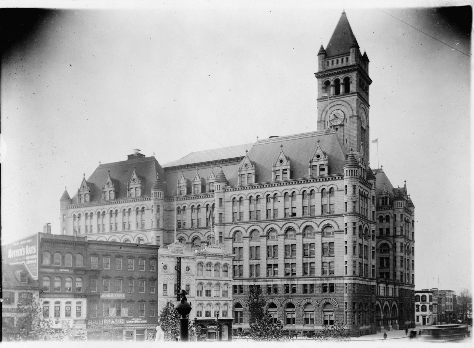 [Exterior of Old Post Office, Washington, D.C. and surrounding buildings], c1910. — historic photograph