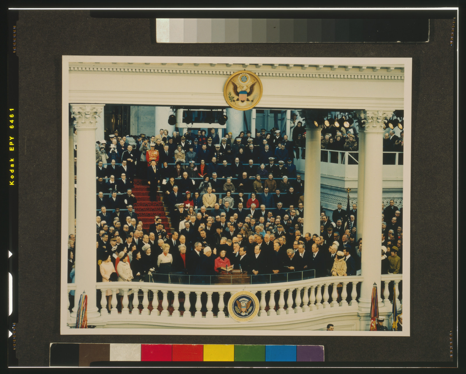 [Chief Justice Earl Warren administering the oath of office to Richard M. Nixon on the east portico of the U.S. Capitol, January 20, 1969], 1969 January 20. — historic photograph