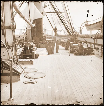 Charleston Harbor S.C. Crew members quarterdeck and starboard battery of U.S.S. Paw