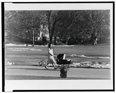 Fresh air on the White House grounds for John F. Kennedy, Jr., in March 1961 / Capa.