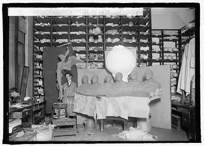 J.A. Atchison with Flight Statue