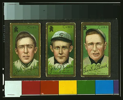 Three Chicago Cubs baseball cards: Tinker, Evers and Chance