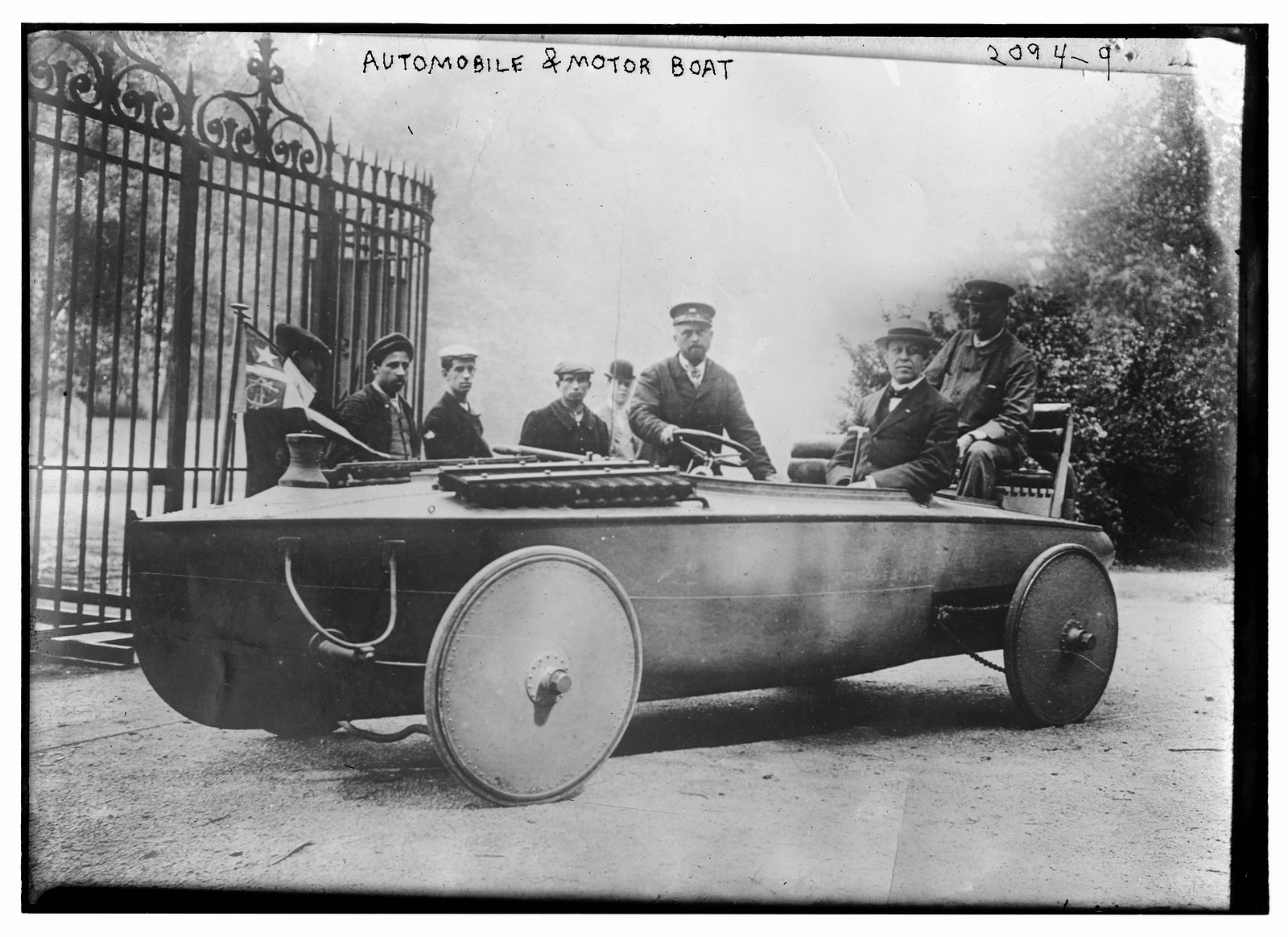Automobile and motor boat, n/a — historic photograph