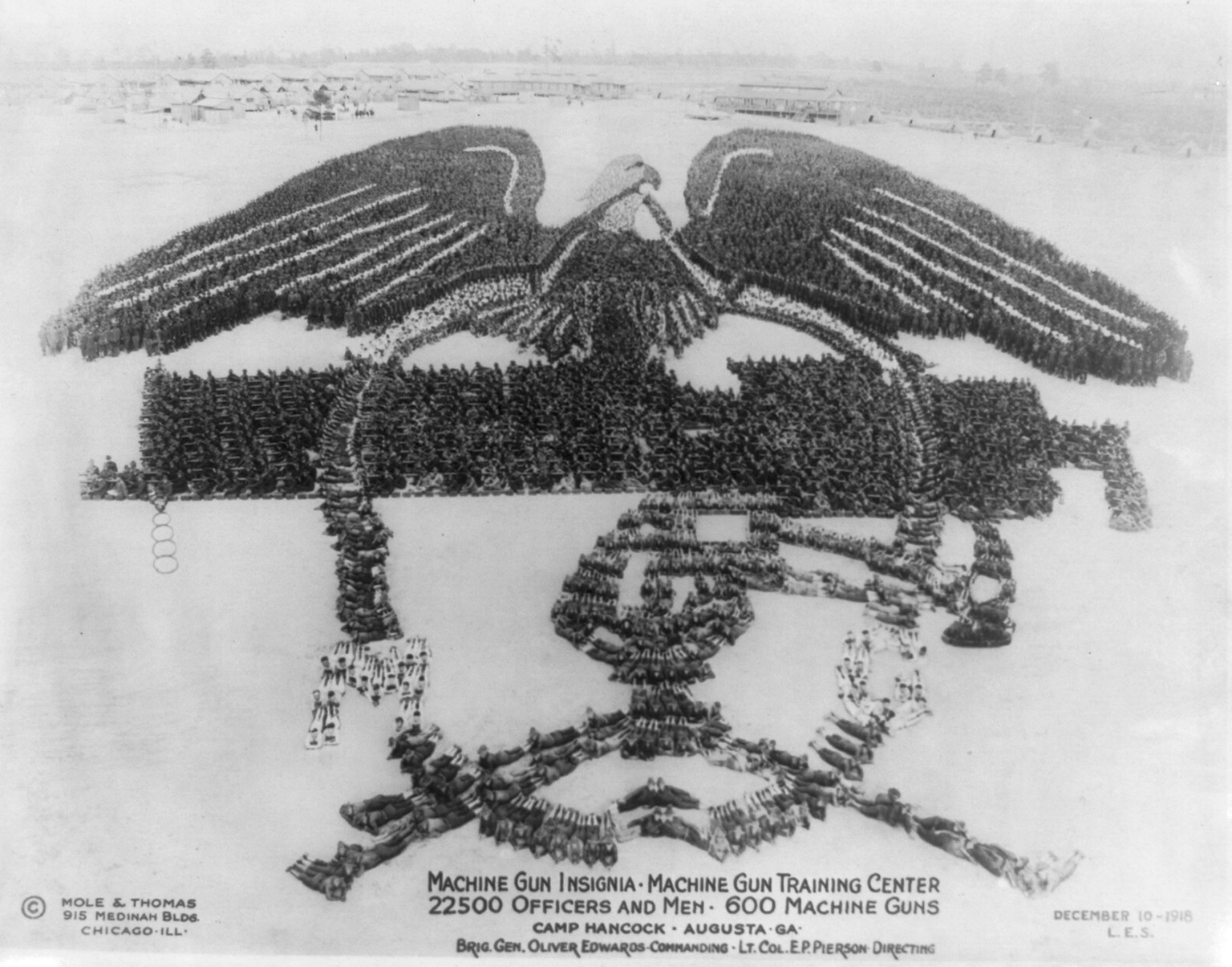 Machine Gun Insignia; Machine Gun Training Center; 22500 officers and men, 600 machine guns; Camp Hancock, Augusta, Ga.; Brig. Gen. Oliver Edwards, commanding; Lt. Col. E.P. Pierson, directing, c1918. — historic photograph