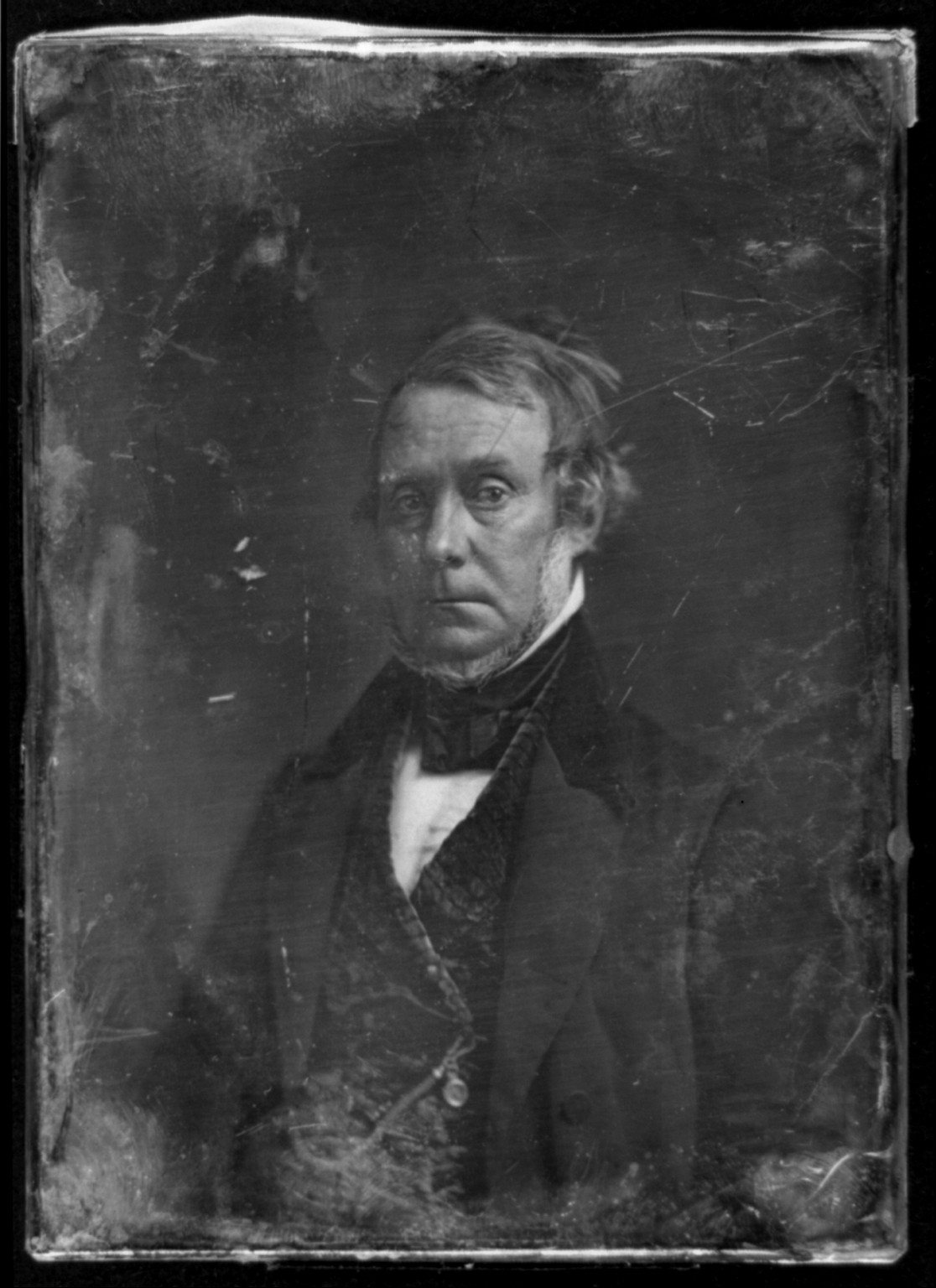Daguerreotype portrait of a man in dark coat, 1844 — historic photograph