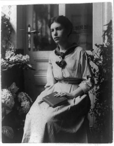 [Anna Freud, three-quarter length portrait, seated, facing left]