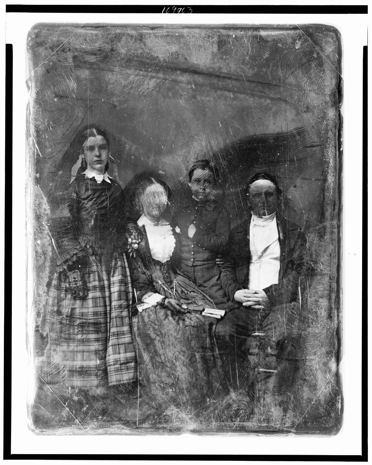 [Hinckley family, of Albany, New York, full-length group portrait, including Dr. John Warren Hinckley, his wife, a son, and daughter Isabella], [1853?] — historic photograph