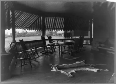 [President Roosevelt's country home, Sagamore Hill in Oyster Bay, New York, view of porch with mountain lion skin on floor]