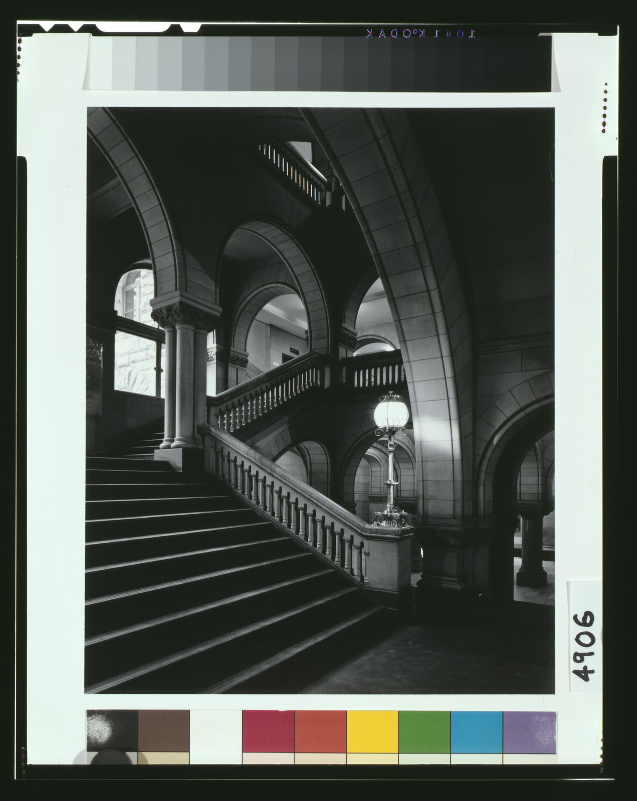 [Interior of Allegheny County Court House, H.H. Richardson, architect, showing staircase with ornate newel light standard, Pittsburgh, Pennsylvania], [ca. 1975] — historic photograph