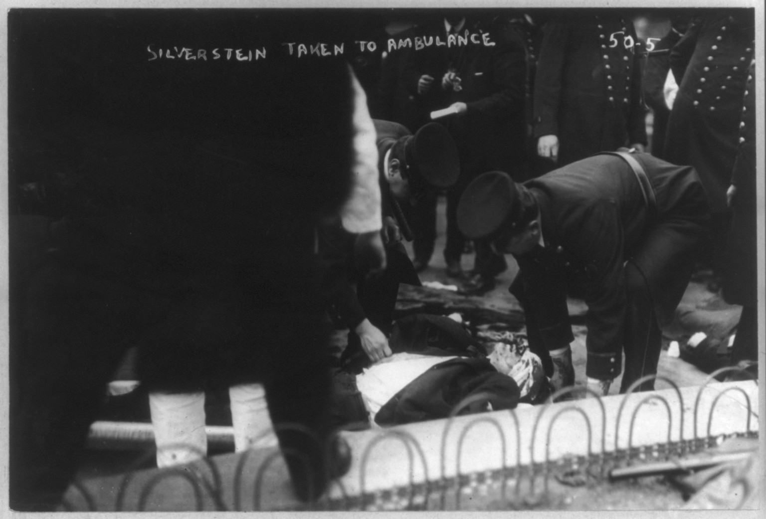 Anarchists - casualty of Anarchist riot, taken to ambulance, Union Square, 1908 March. — historic photograph