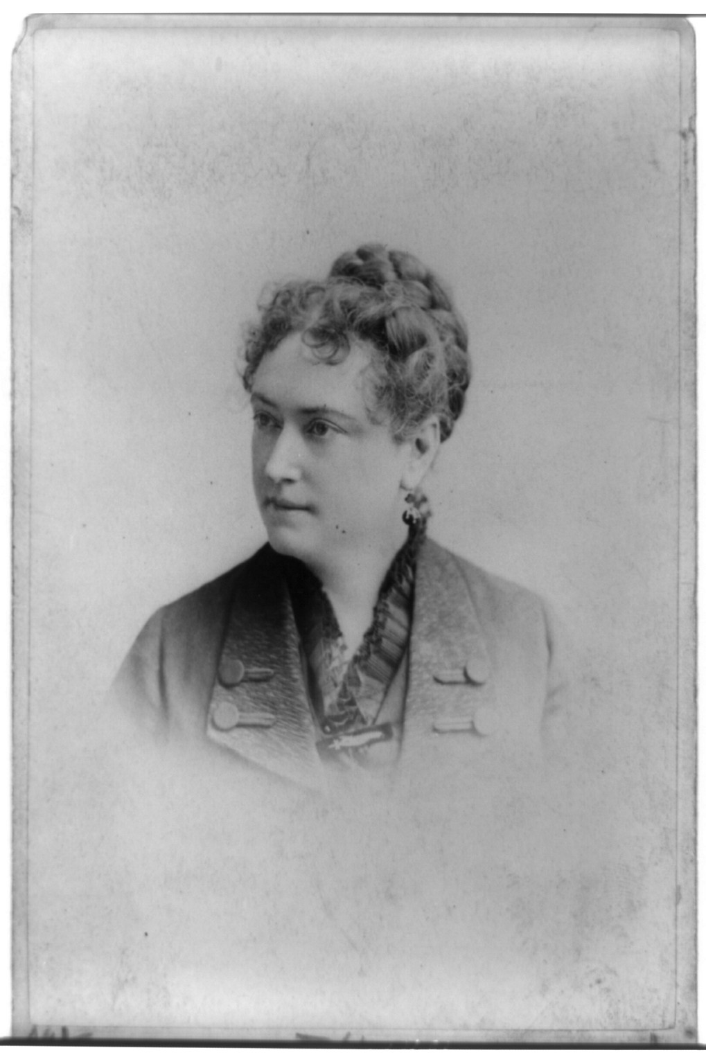 [Mrs. A.R. Hancock, head-and-shoulders portrait, facing left], [between 1866 and 1890] — historic photograph