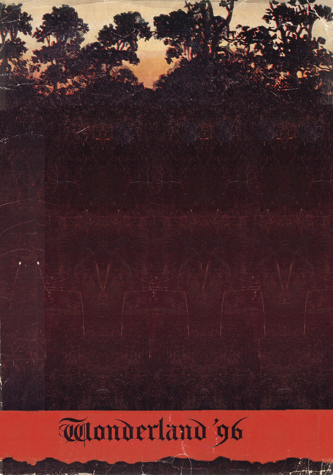 Wonderland '96 cover with silhouetted trees at dusk — historic image
