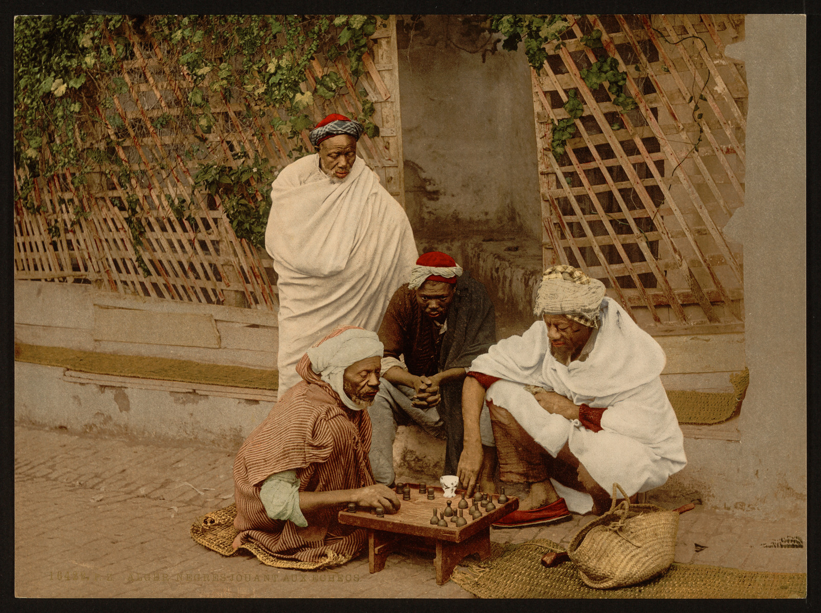 Negroes playing chess Algiers Algeria, [ca. 1899]. — historic print